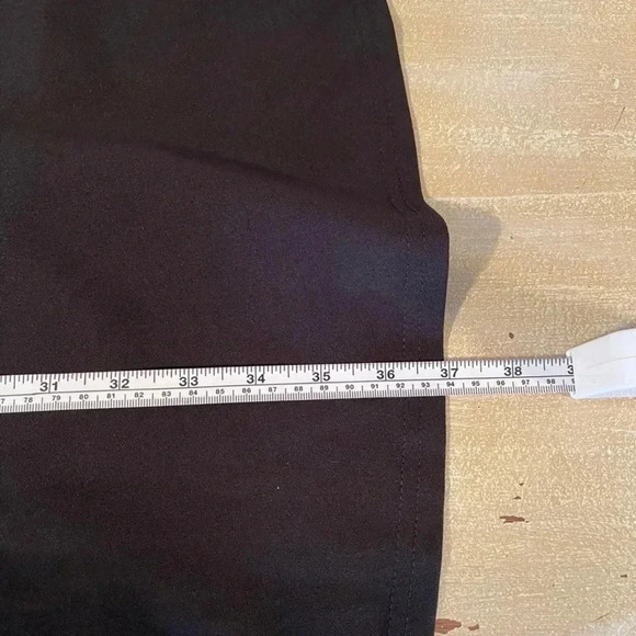 Dress with lace up detail on sides. Zipper in back. - Picture 11 of 12